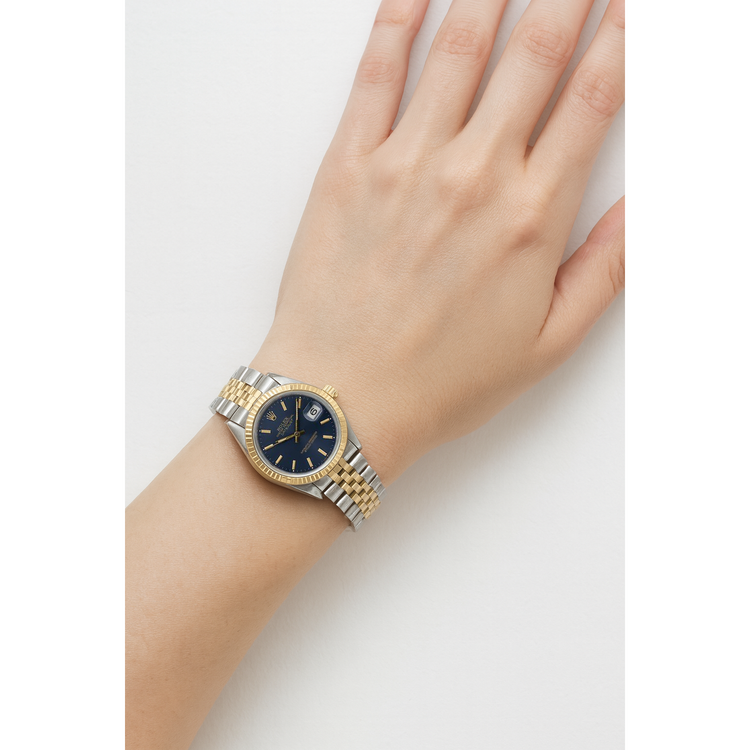 Montre Rolex dame Datejust en acier or jaune 18 carats avec cadran bleu 31 mm