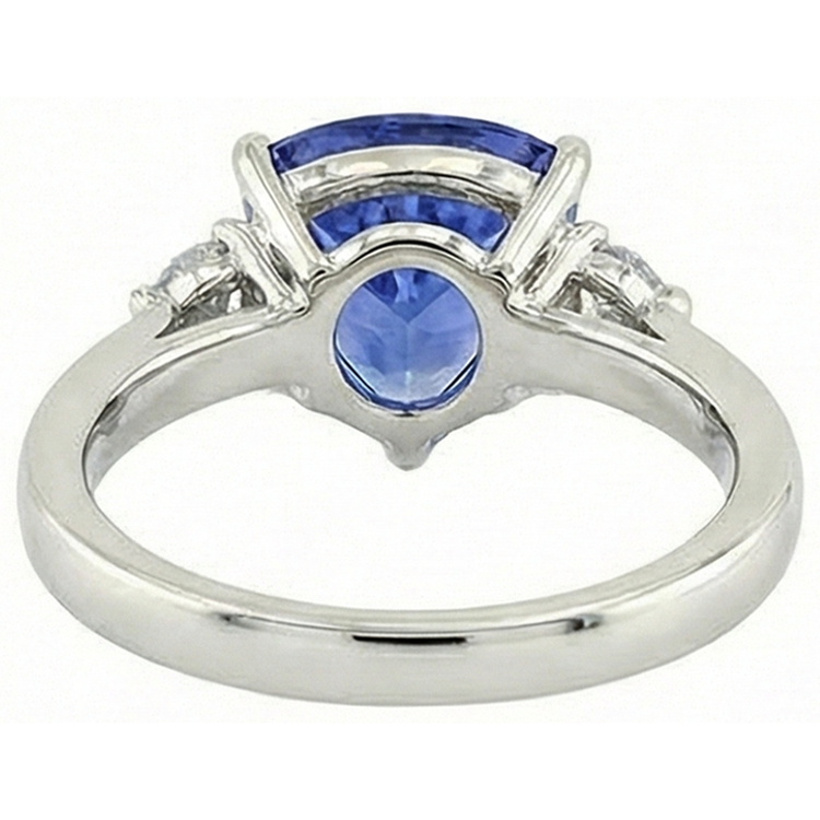 Bague à trois pierres en tanzanite et diamants 7 carats en or blanc 14K