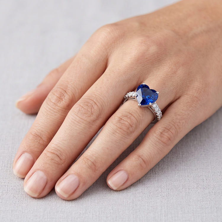 Bague diamant saphir bleu serti cathédrale Accents ronds