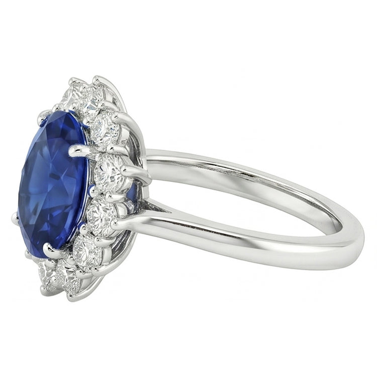 Bague saphir bleu ovale et halo de diamants ronds 6,50 ct. Or Blanc 14K
