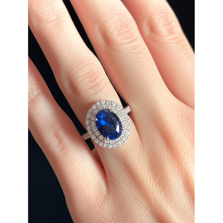 Bague saphir de Ceylan ovale de 3.40 ct avec diamants ronds en or blanc