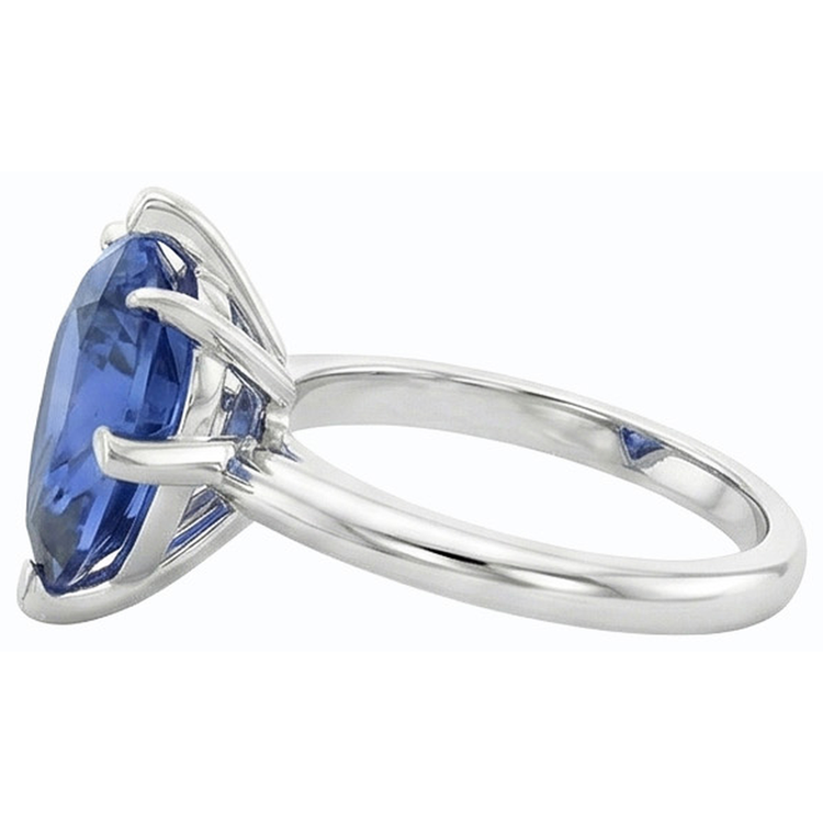 Bague solitaire poire sertie de griffes saphir bleu 2.50 carats