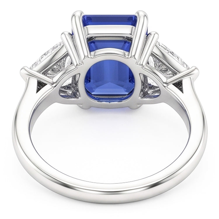 Bague trois pierres saphir bleu. émeraude et trillion de diamants 2.50 carats