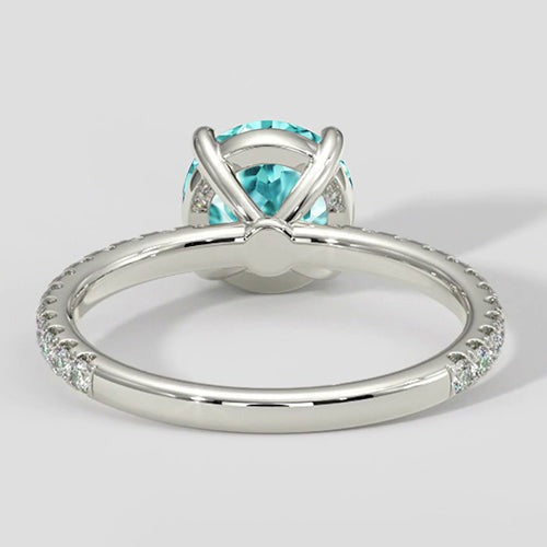 Bague Paraiba bleue avec des accents de diamants ronds