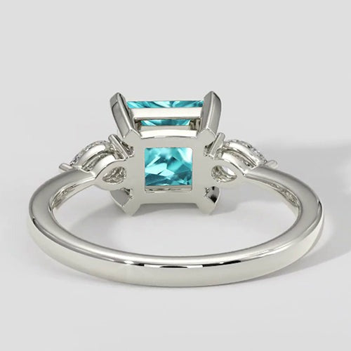 Bague de fiançailles Paraiba Coussin à trois pierres