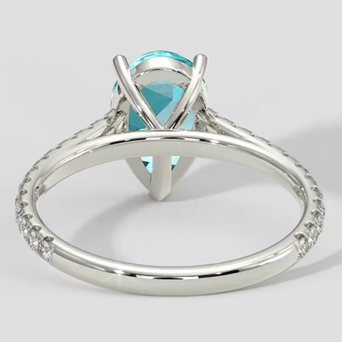 Bague élégante en forme de poire Paraiba avec pavé
