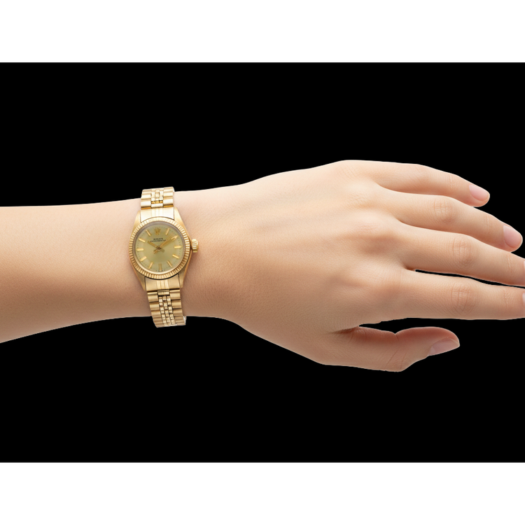 Montre Rolex Oyster Perpetual 24 mm avec cadran champagne et or jaune