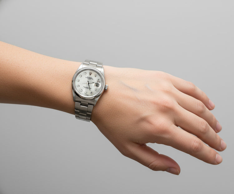 Montre Rolex Date en acier inoxydable avec cadran en nacre blanche et diamants de 34 mm