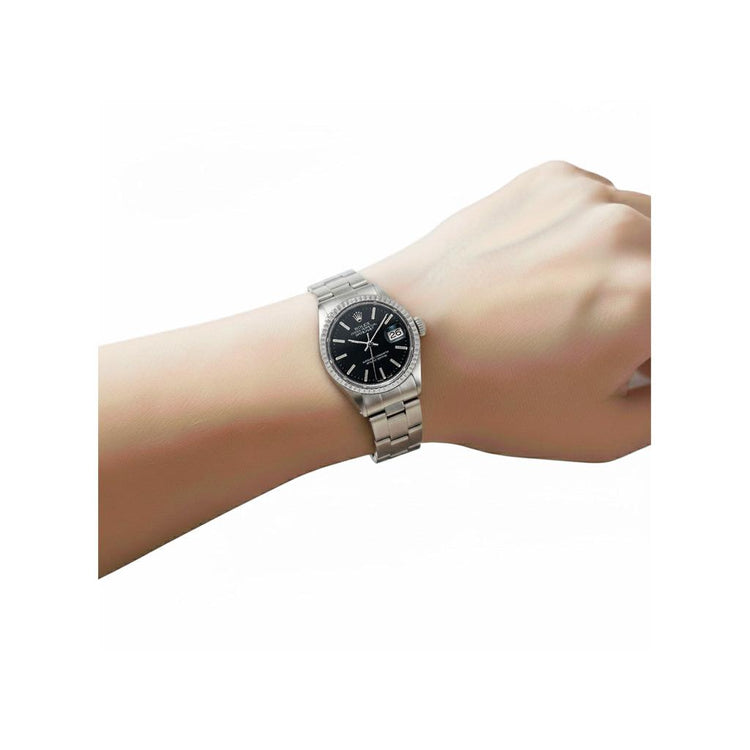 Montre Rolex Lady Datejust cadran noir en acier inoxydable 26 mm