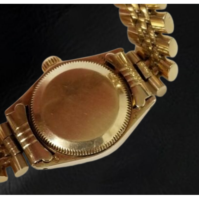 Montre Rolex Oyster Perpetual 24 mm avec cadran bâton de champagne en or jaune