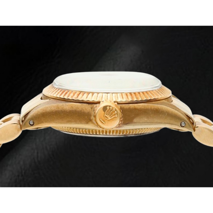 Montre Rolex Oyster Perpetual 24 mm avec cadran champagne et or jaune