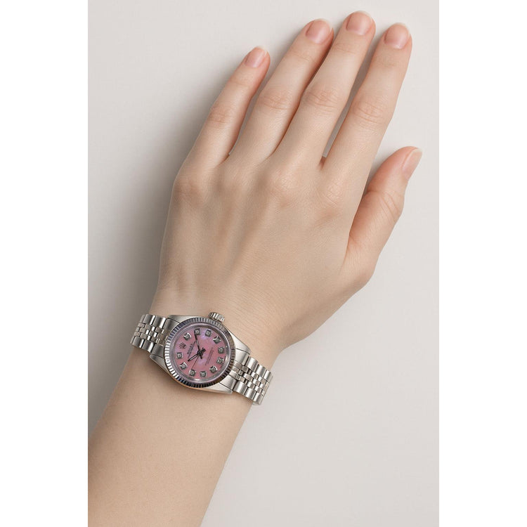 Montre Rolex Oyster Perpetual en acier inoxydable avec lunette cannelée et cadran diamant