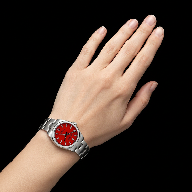 Montre Rolex dame huître Perpétuelle 31 mm en acier à cadran lumineux rouge corail