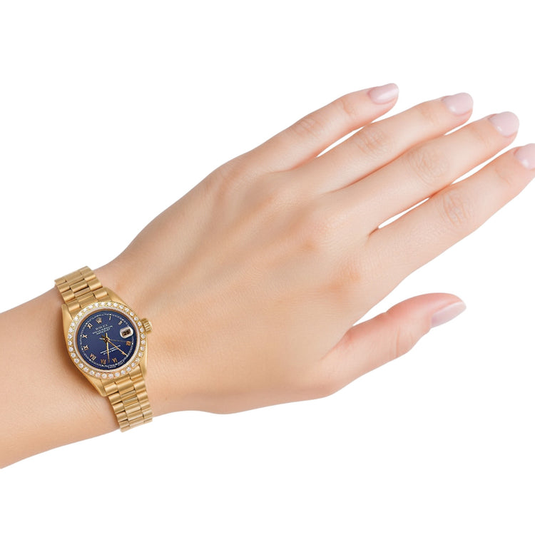 Montre Rolex pour femme de still présidentiel or jaune Datejust avec cadran romain bleu P2