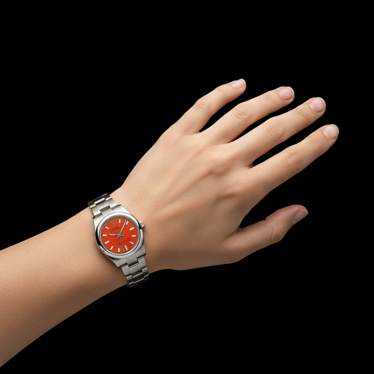 Montre pour homme en acier à cadran lumineux rouge corail Rolex Oyster Perpetual 31 mm