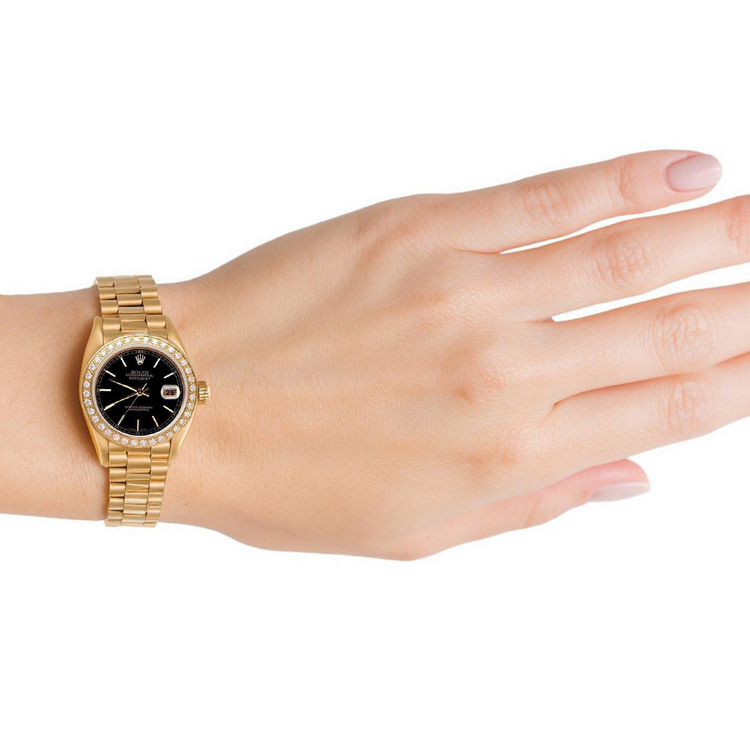 Montre présidentielle à cadran bâton noir Datejust Rolex, lunette en or et diamants