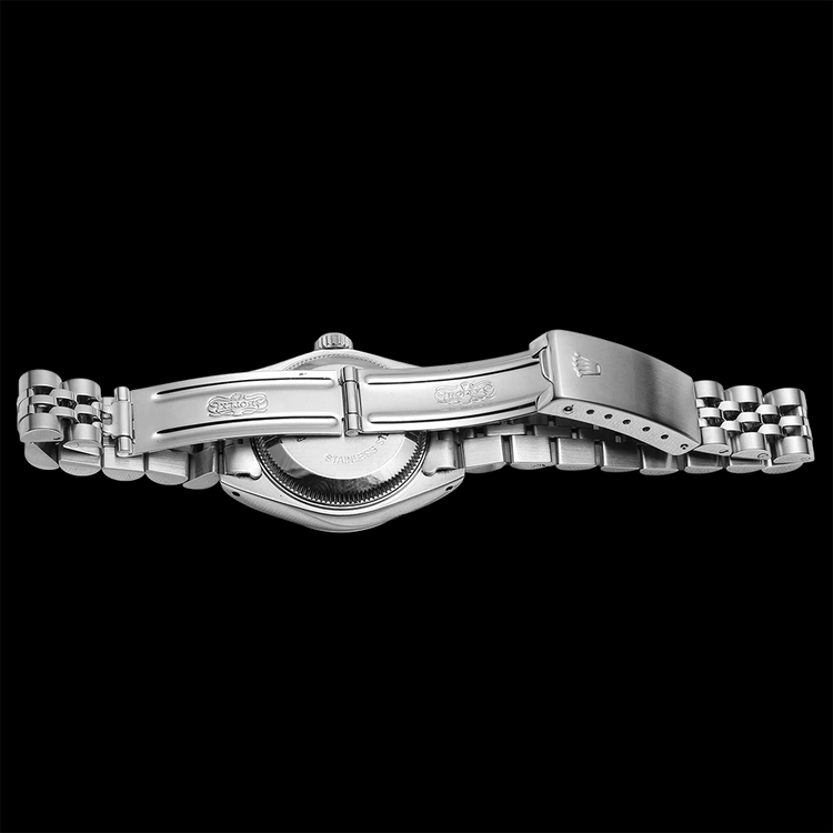 Rolex dame Datejust montre argent acier inoxydable jubilé bracelet lunette cannelée
