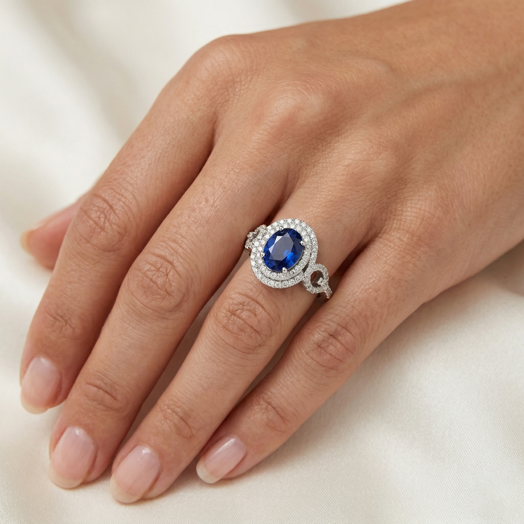 Saphir de Ceylan ovale en or blanc 2.75 carats avec bague en diamant rond