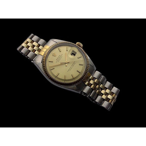 montre Rolex vintage en or massif et acier inoxydable