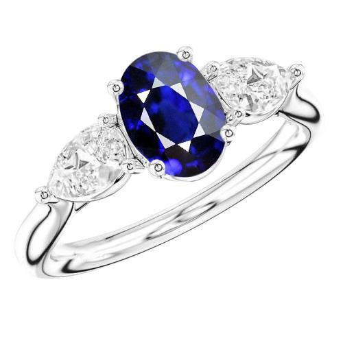 3 carats trois pierres ovales saphir bleu profond et diamants poire