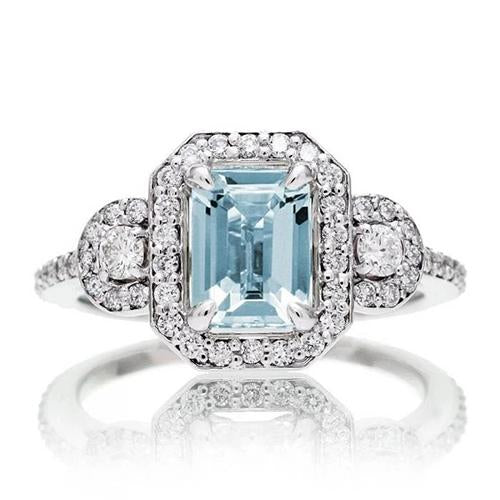 bague aigue-marine taille émeraude et petits diamants de 6.25 ct en or blanc