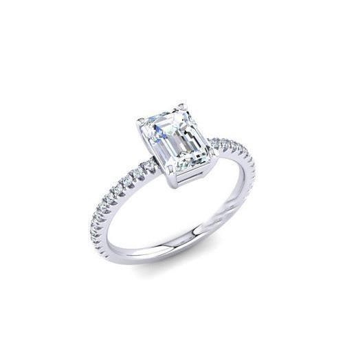 Bague en or blanc 750, sertie d'une émeraude et de 22 diamants - Occasion Bague en or blanc 750, sertie d'une émeraude et de 22 diamants - Occasion