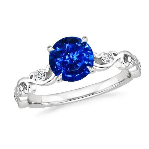 Bague en saphir rond bleu de 1.60 ct et diamants - HarryChadEnt.FR