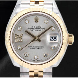 279173 Magnifique montre pour femme Rolex avec cadran en diamant argenté et or 18 carats