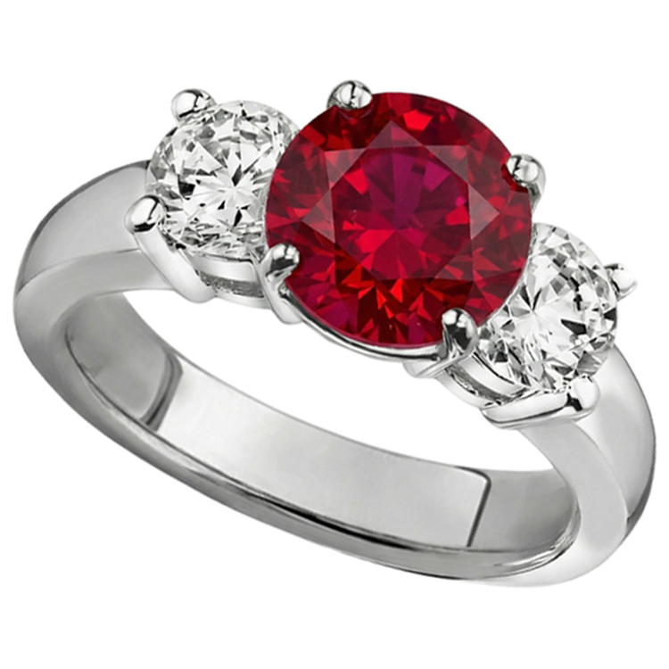 3.50 ct. Bague 3 pierres rubis et diamants sertie griffes en or blanc