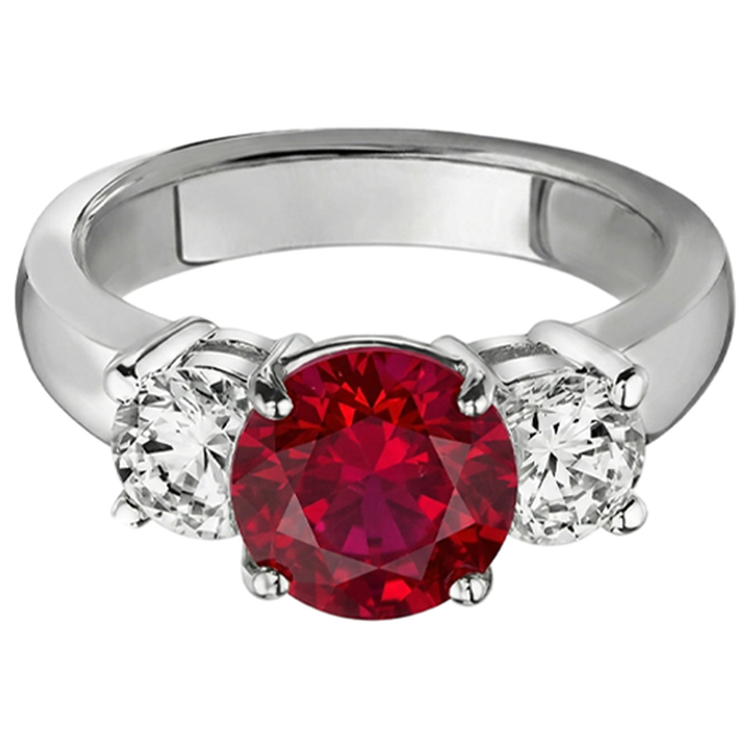 3.50 ct. Bague 3 pierres rubis et diamants sertie griffes en or blanc