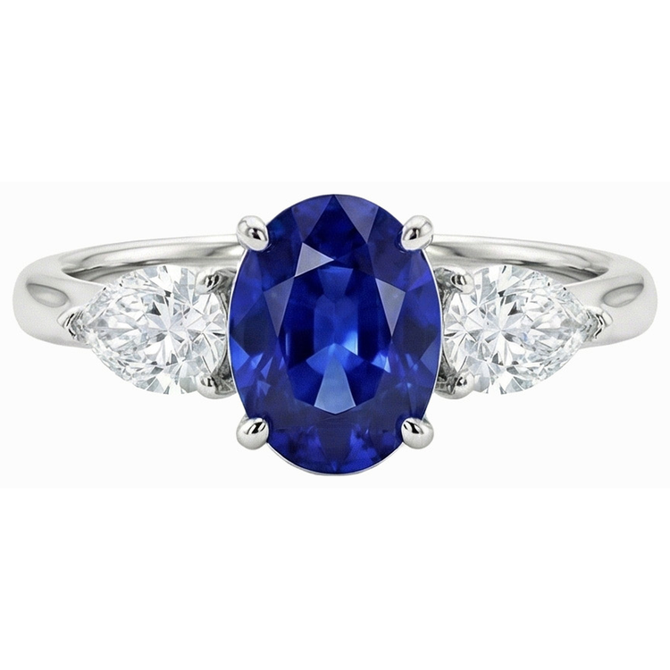 3 carats trois pierres ovales saphir bleu profond et diamants poire