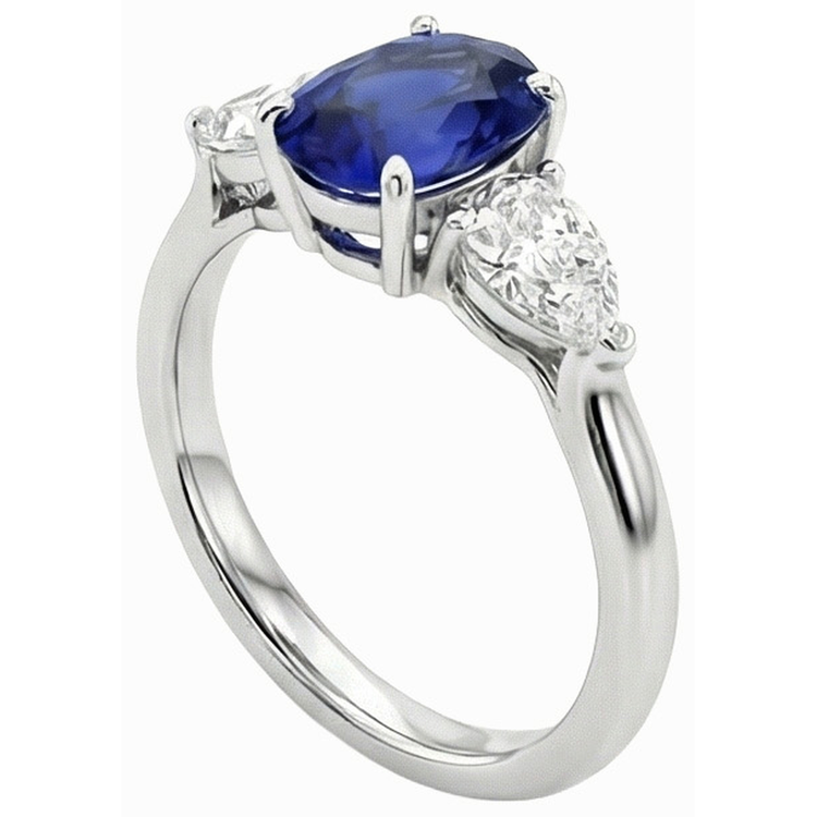 3 carats trois pierres ovales saphir bleu profond et diamants poire