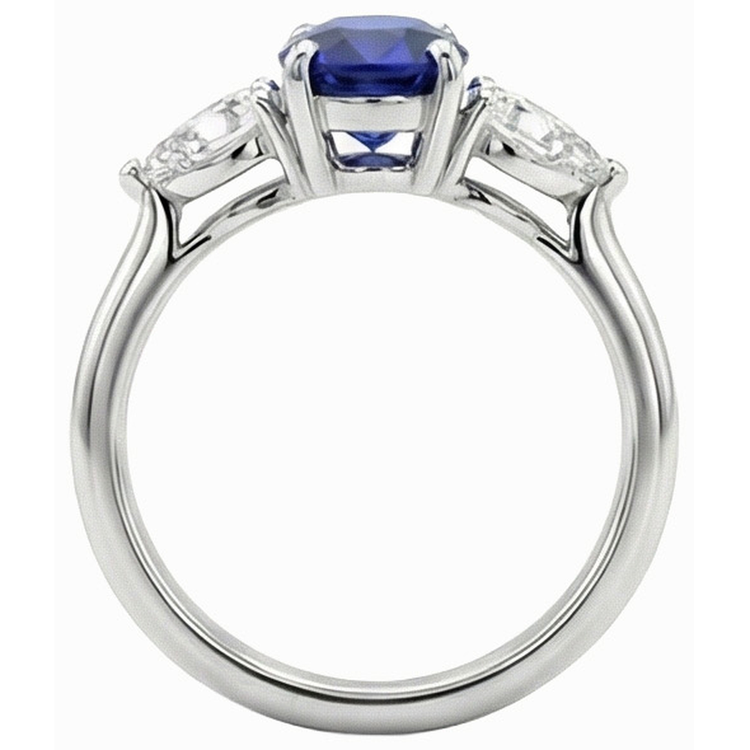 3 carats trois pierres ovales saphir bleu profond et diamants poire