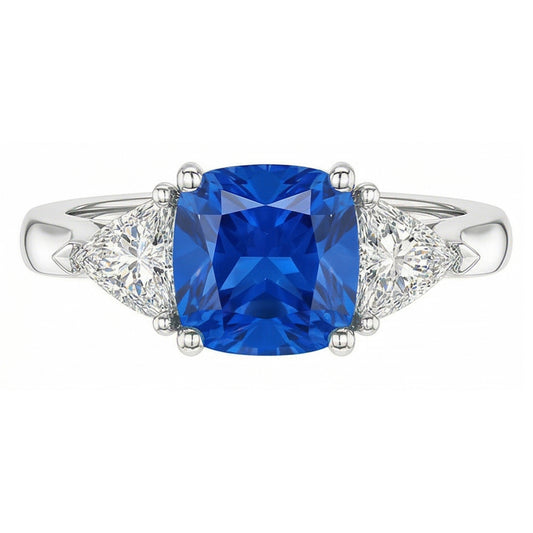 Bague 3 pierres coussin saphir bleu clair 1.50 carats trillion de diamants
