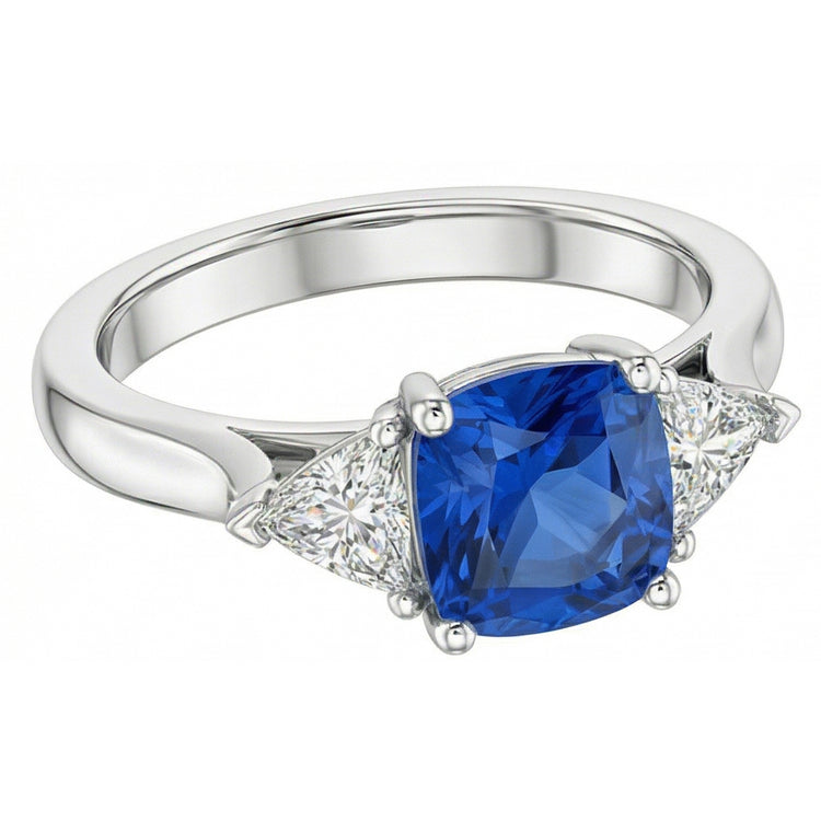 Bague 3 pierres coussin saphir bleu clair 1.50 carats trillion de diamants