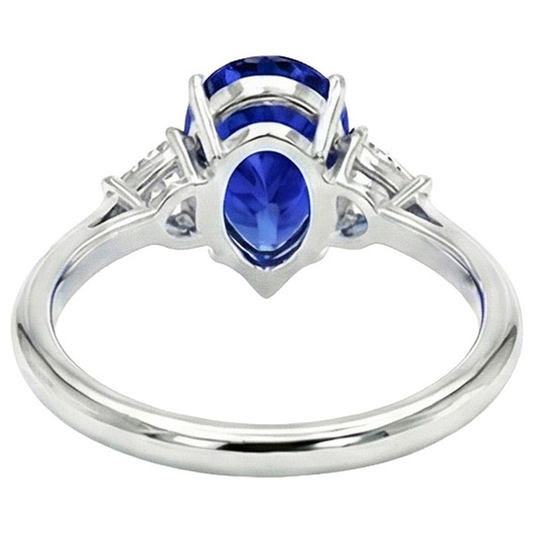 Bague 3 pierres en or blanc Saphir bleu et mille milliards de diamants 2.25 carats