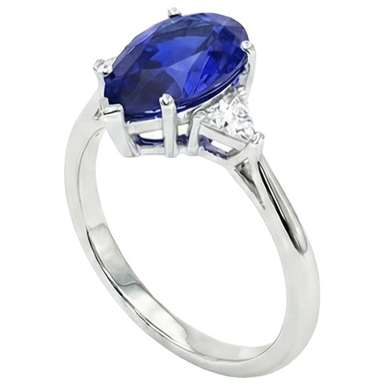 Bague 3 pierres en or blanc Saphir bleu et mille milliards de diamants 2.25 carats