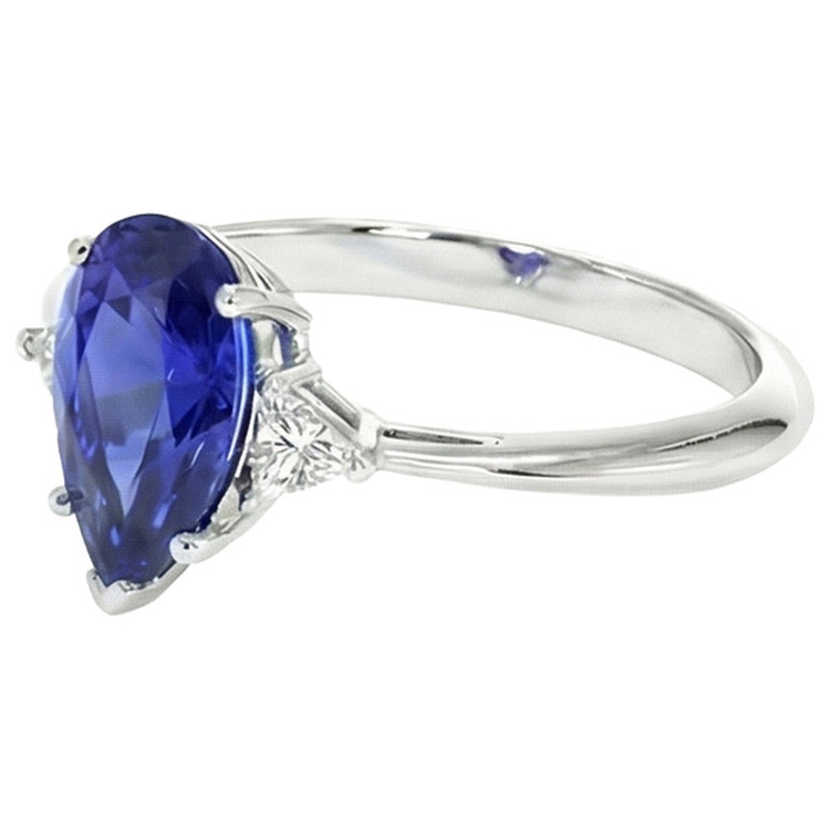 Bague 3 pierres en or blanc Saphir bleu et mille milliards de diamants 2.25 carats
