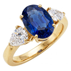 Bague 3 pierres ovale or jaune saphir bleu et diamant poire 5.25 carats