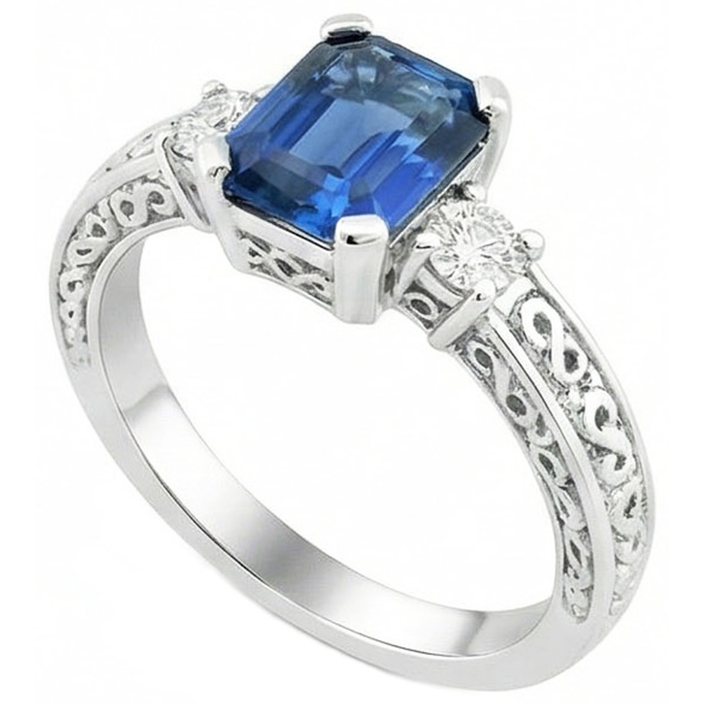 Bague 3 pierres saphir taille émeraude bleue et diamants en or 2.50 carats