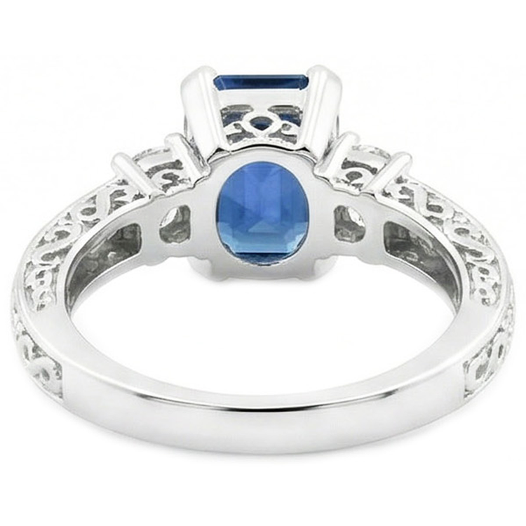 Bague 3 pierres saphir taille émeraude bleue et diamants en or 2.50 carats