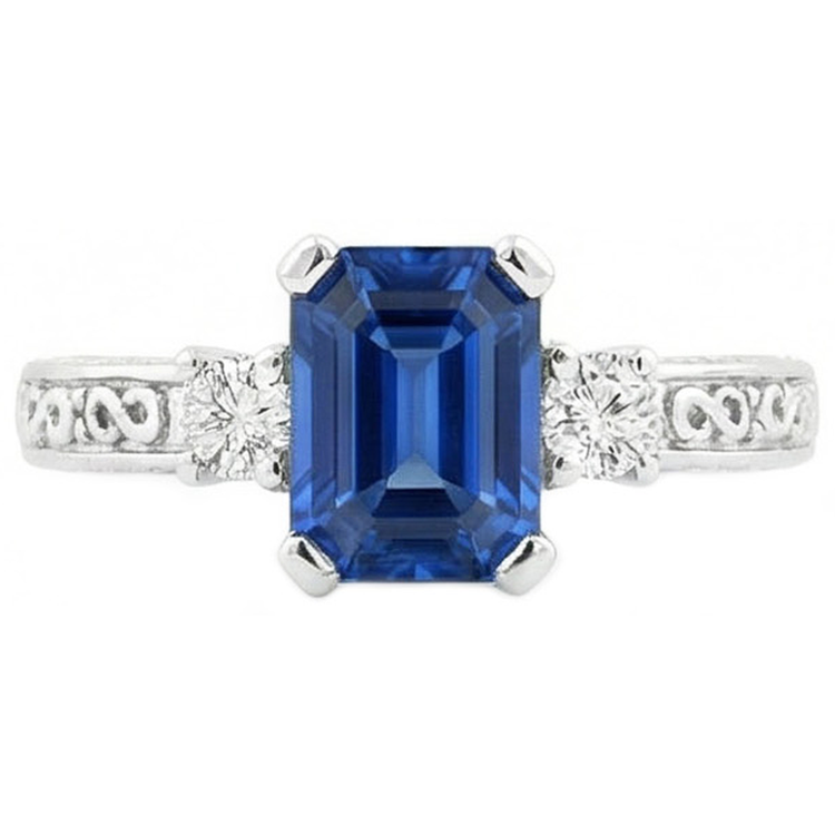 Bague 3 pierres saphir taille émeraude bleue et diamants en or 2.50 carats