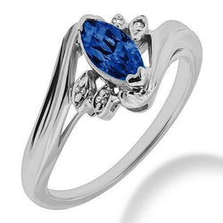 Bague Ceylan avec saphir bleu taille marquise et diamants en or 1.10 ct.
