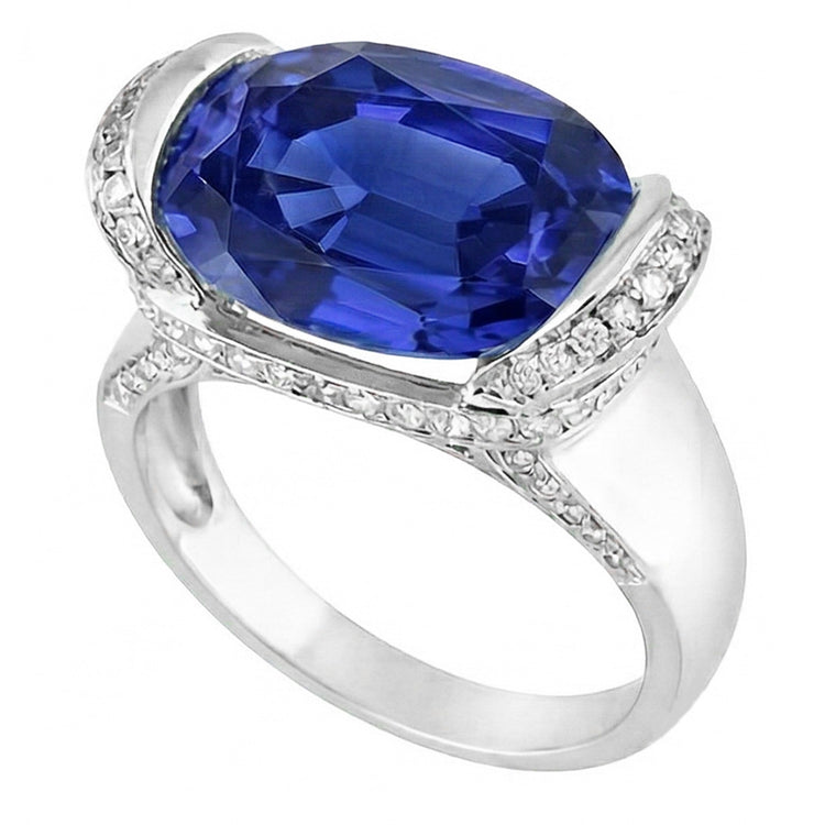 Bague Diamant Rond et Saphir Bleu Taille Ovale Sertissage Barrette 5.50 Carats