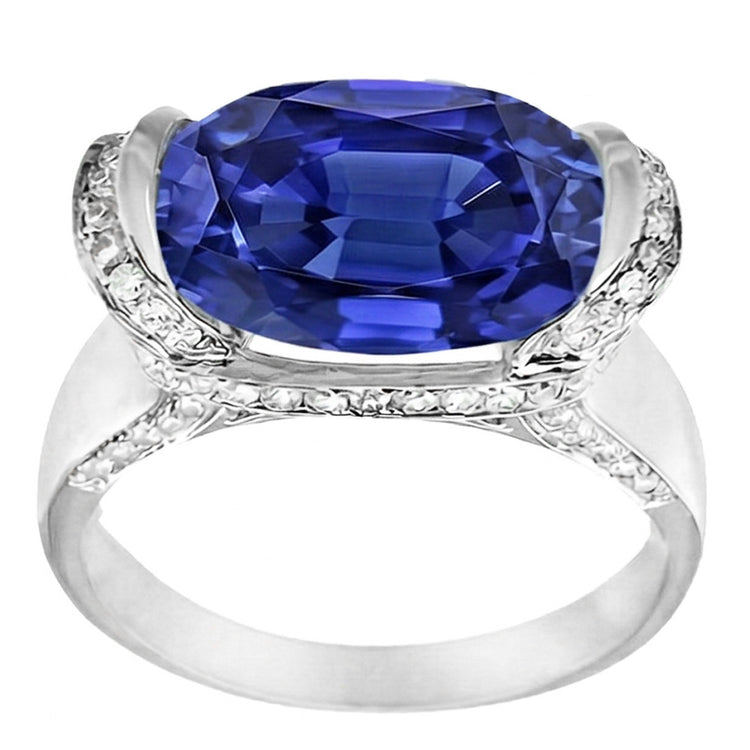 Bague Diamant Rond et Saphir Bleu Taille Ovale Sertissage Barrette 5.50 Carats