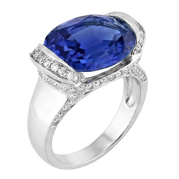 Bague Diamant Rond et Saphir Bleu Taille Ovale Sertissage Barrette 5.50 Carats