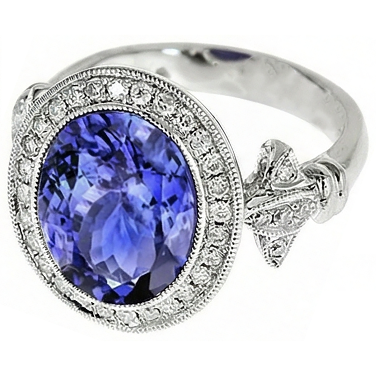 Bague Fantaisie Tanzanite 9 Carats Avec Petits Diamants Naturels Extraits des Mines ( et non cultivés en laboratoire ) Or Blanc 14K