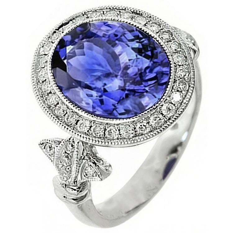 Bague Fantaisie Tanzanite 9 Carats Avec Petits Diamants Naturels Extraits des Mines ( et non cultivés en laboratoire ) Or Blanc 14K