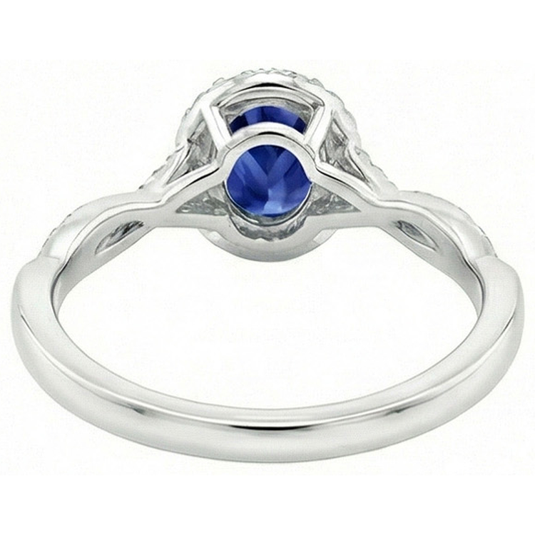 Bague Halo Diamants Naturels Extraits des Mines ( et non cultivés en laboratoire ) 4.25 Carats Saphir Bleu Ovale Or Blanc Pétillant