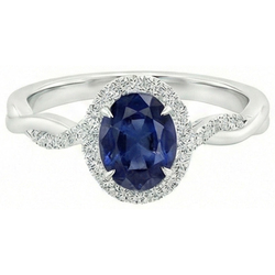 Bague Halo Diamants Naturels Extraits des Mines ( et non cultivés en laboratoire ) 4.25 Carats Saphir Bleu Ovale Or Blanc Pétillant